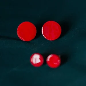 Bottoncini tondi in pelle verniciata